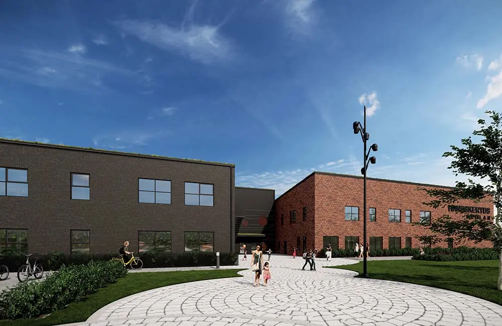 Projektbild för skola med byggnad och omgivning.